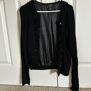 Black cardigan with beaded border.